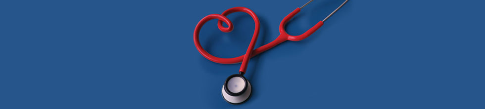 red stethoscope on blue background
